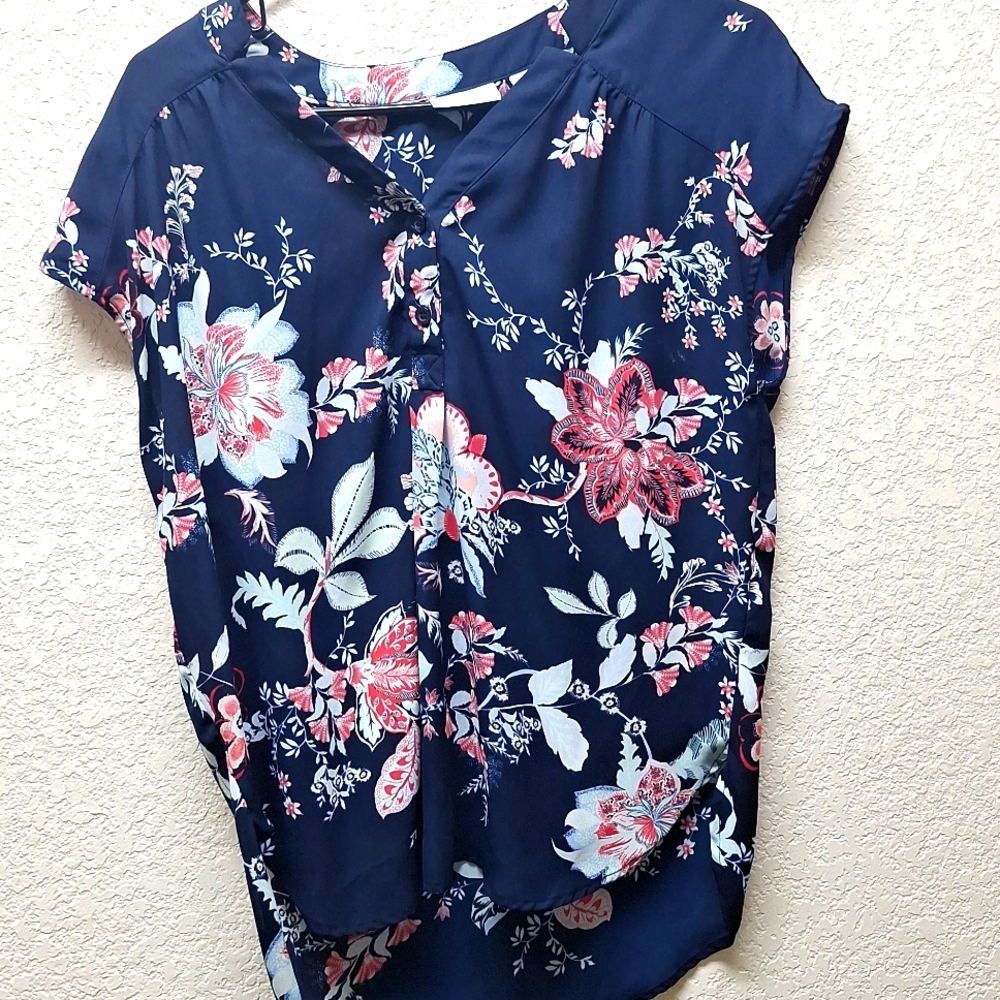 Navy shirt floral design.